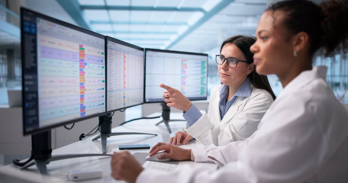 Professional analyzing data on a computer monitor